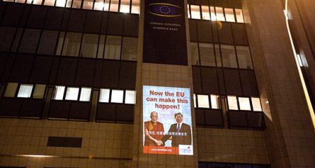 EU Council Building in Brussels illuminated by the International Campaign for Tibet