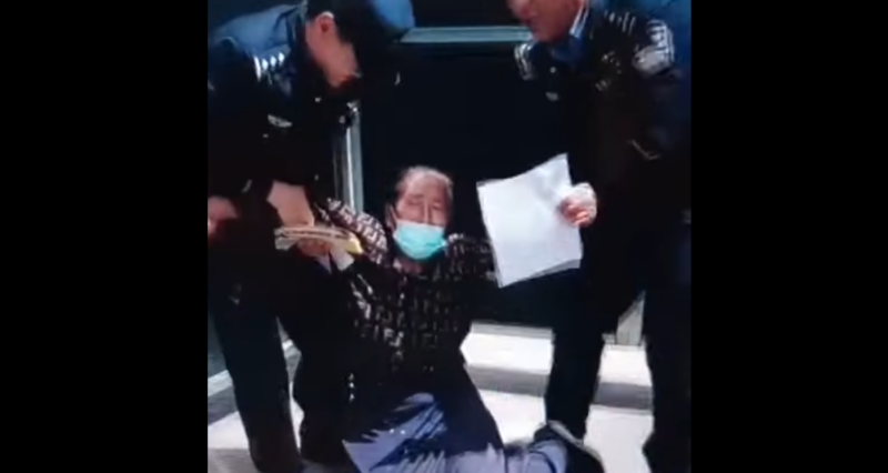Police forcibly remove imprisoned Tibetan’s protesting sister